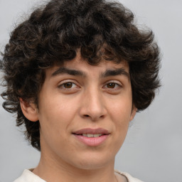 Joyful white young-adult male with medium  brown hair and brown eyes