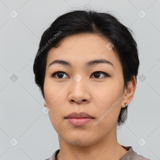 Neutral asian young-adult female with medium  black hair and brown eyes