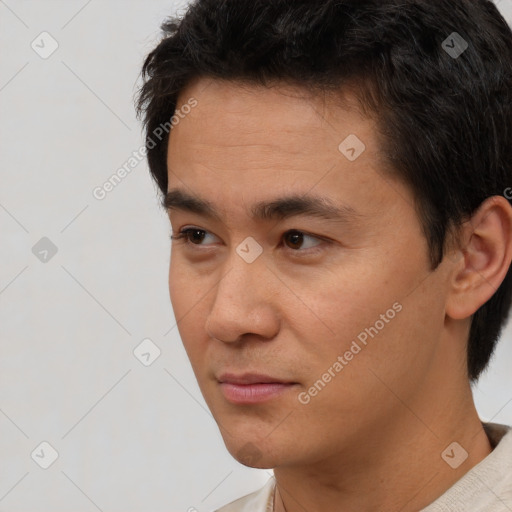 Neutral white young-adult male with short  black hair and brown eyes