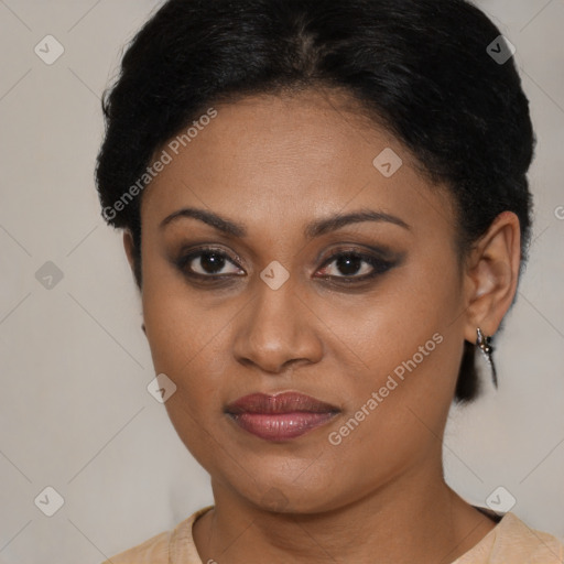Joyful black young-adult female with short  brown hair and brown eyes