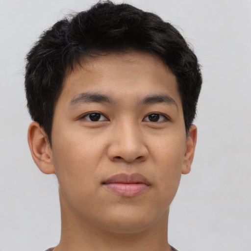 Neutral latino young-adult male with short  brown hair and brown eyes