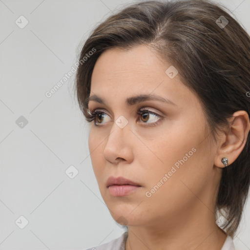 Neutral white young-adult female with medium  brown hair and brown eyes