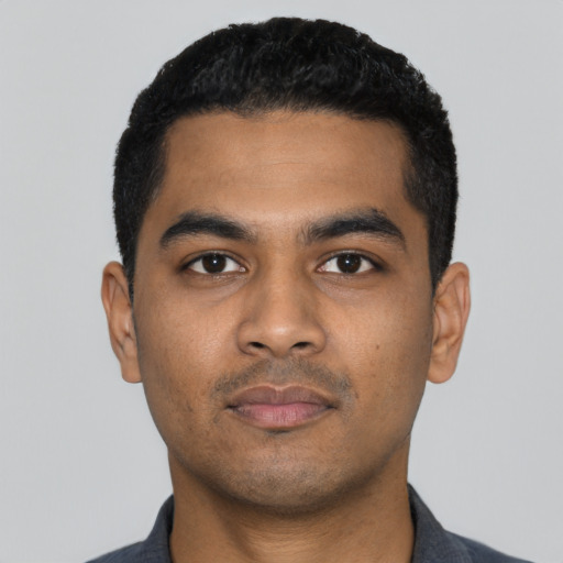 Neutral latino young-adult male with short  black hair and brown eyes