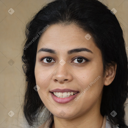 Joyful latino young-adult female with medium  brown hair and brown eyes