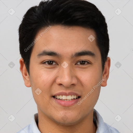 Joyful asian young-adult male with short  black hair and brown eyes