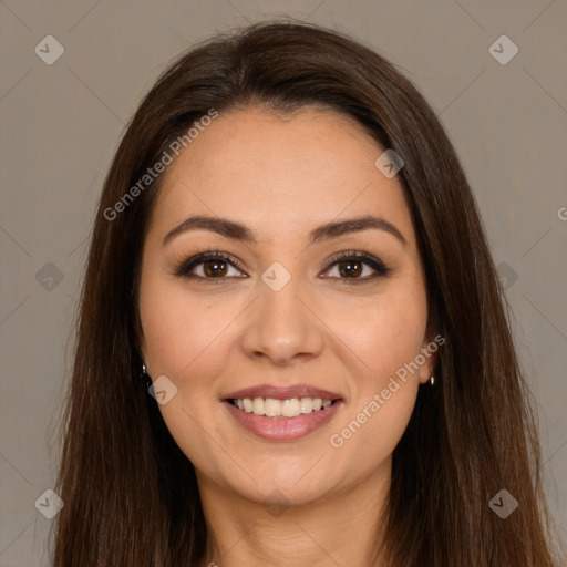 Joyful white young-adult female with long  brown hair and brown eyes