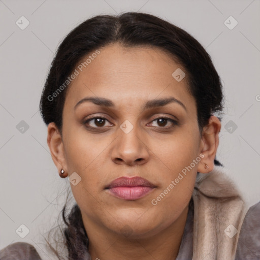 Joyful latino young-adult female with medium  brown hair and brown eyes