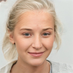 Joyful white young-adult female with medium  brown hair and blue eyes