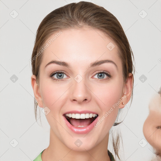 Joyful white young-adult female with medium  brown hair and grey eyes