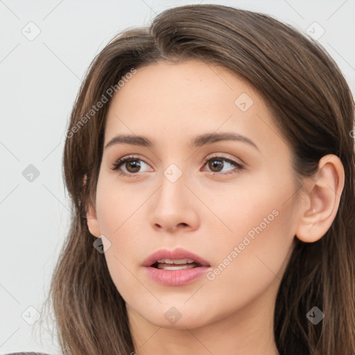 Neutral white young-adult female with long  brown hair and brown eyes