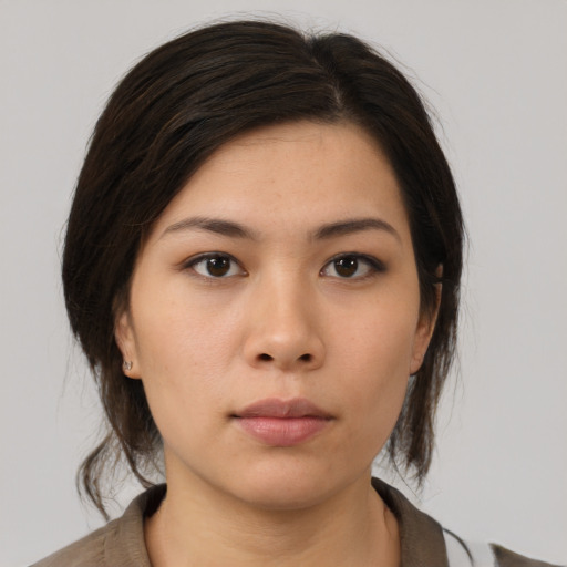 Neutral asian young-adult female with medium  brown hair and brown eyes