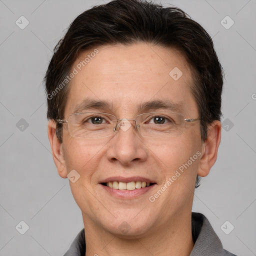 Joyful white adult male with short  brown hair and grey eyes