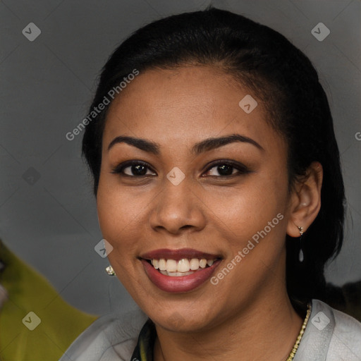 Joyful latino young-adult female with short  brown hair and brown eyes