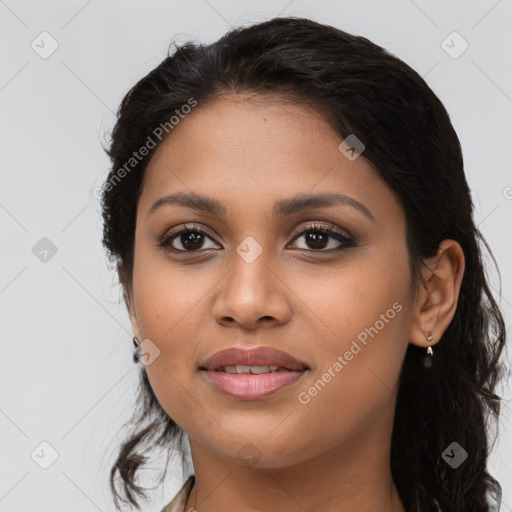 Joyful latino young-adult female with long  brown hair and brown eyes