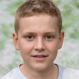 Joyful white child male with short  brown hair and brown eyes