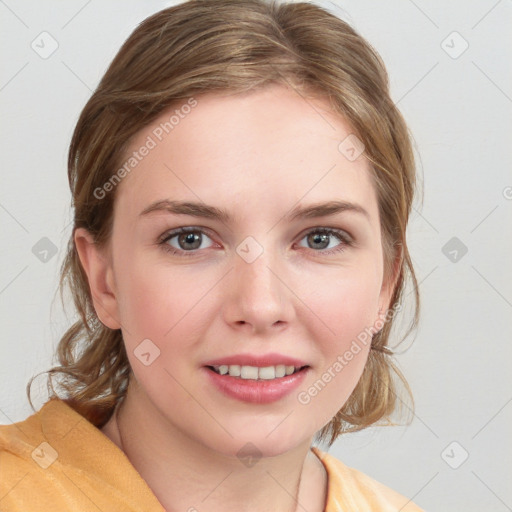 Joyful white young-adult female with medium  brown hair and blue eyes