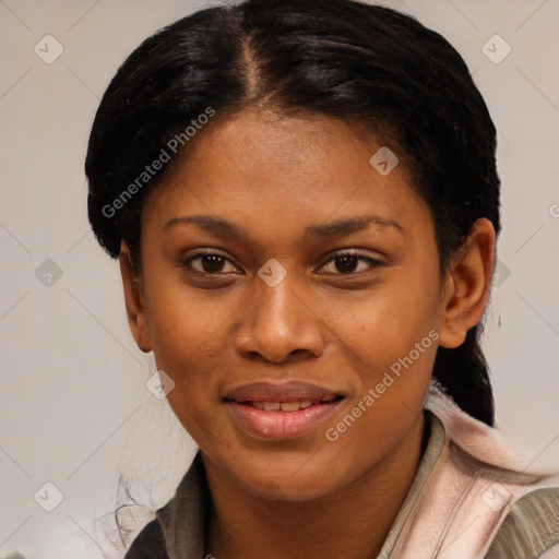 Joyful black young-adult female with short  brown hair and brown eyes