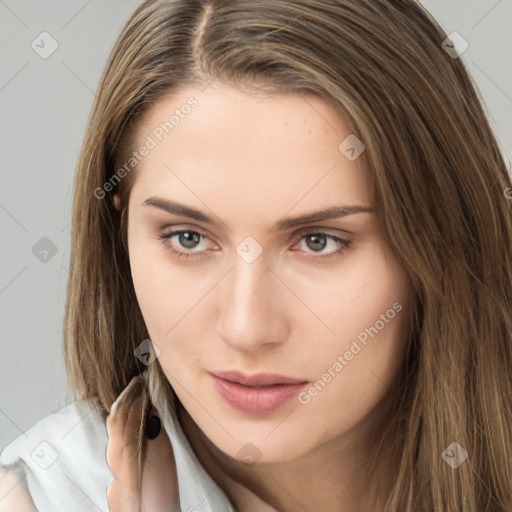 Neutral white young-adult female with long  brown hair and brown eyes