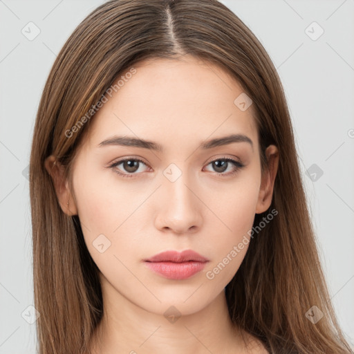 Neutral white young-adult female with long  brown hair and brown eyes