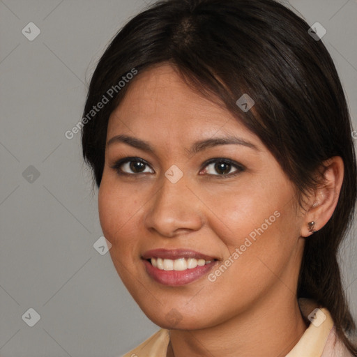 Joyful latino young-adult female with medium  brown hair and brown eyes