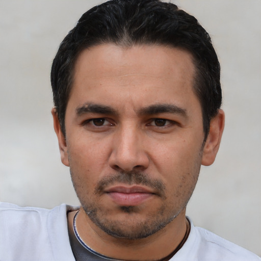 Neutral white young-adult male with short  black hair and brown eyes