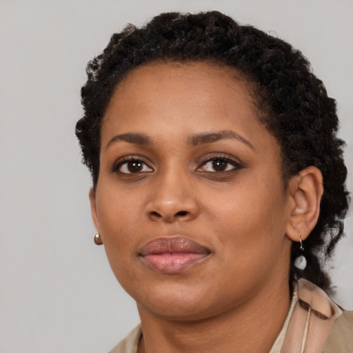 Neutral black young-adult female with short  brown hair and brown eyes