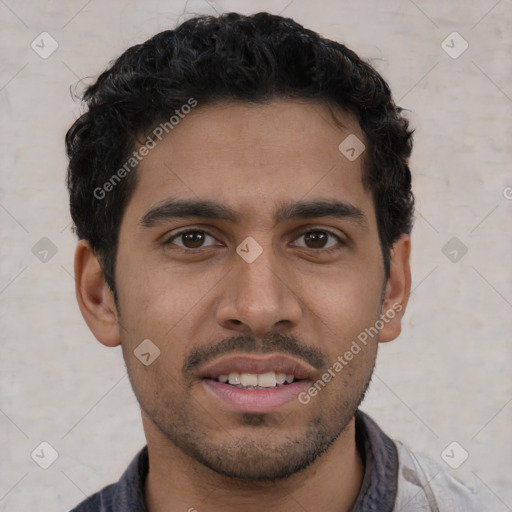 Joyful latino young-adult male with short  brown hair and brown eyes