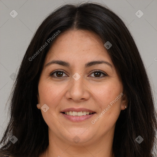 Joyful white adult female with long  brown hair and brown eyes