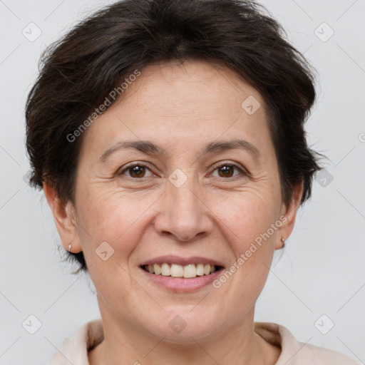 Joyful white adult female with short  brown hair and brown eyes