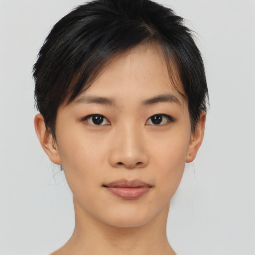 Neutral asian young-adult female with short  brown hair and brown eyes