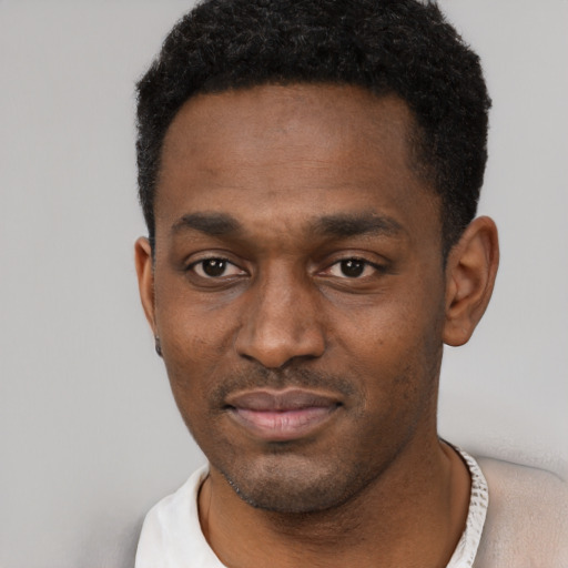 Neutral black young-adult male with short  black hair and brown eyes
