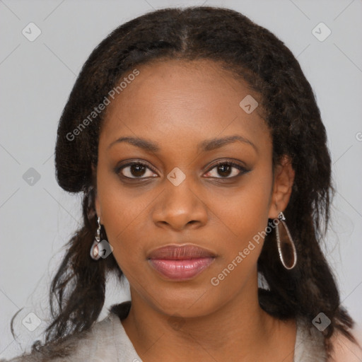 Joyful black young-adult female with medium  brown hair and brown eyes