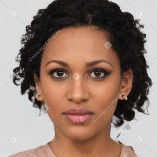 Joyful black young-adult female with medium  black hair and brown eyes