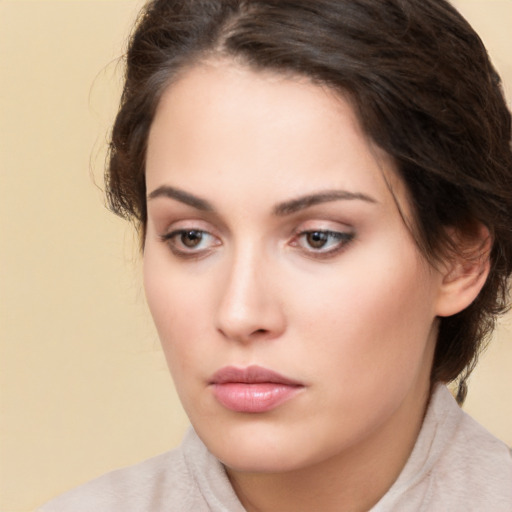 Neutral white young-adult female with medium  brown hair and brown eyes