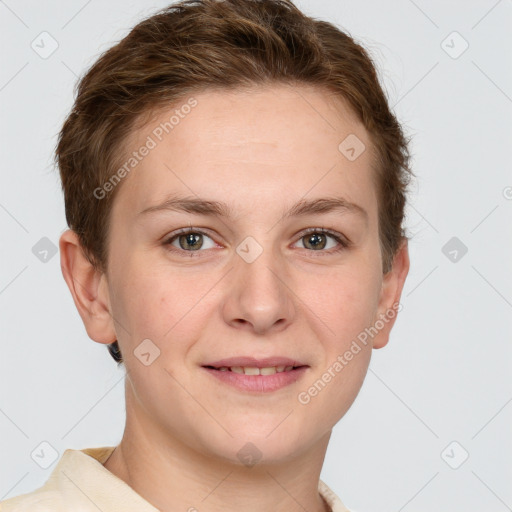 Joyful white young-adult female with short  brown hair and grey eyes