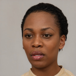 Neutral black young-adult female with short  black hair and brown eyes