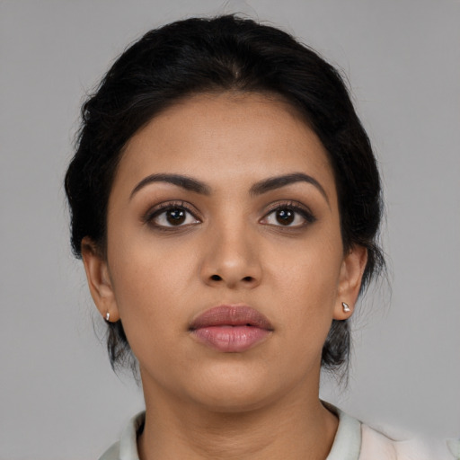 Neutral latino young-adult female with medium  black hair and brown eyes