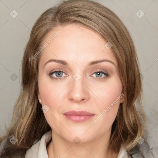 Joyful white young-adult female with medium  brown hair and blue eyes