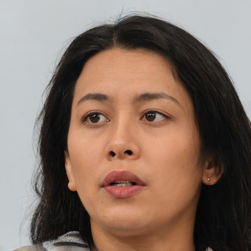 Neutral asian young-adult female with medium  brown hair and brown eyes
