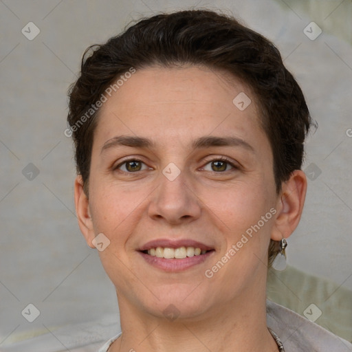 Joyful white adult female with short  brown hair and brown eyes