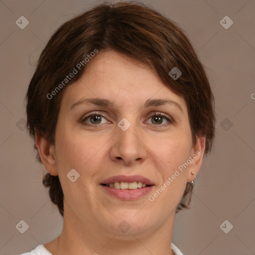 Joyful white young-adult female with medium  brown hair and green eyes