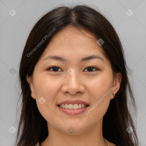 Joyful asian young-adult female with long  brown hair and brown eyes