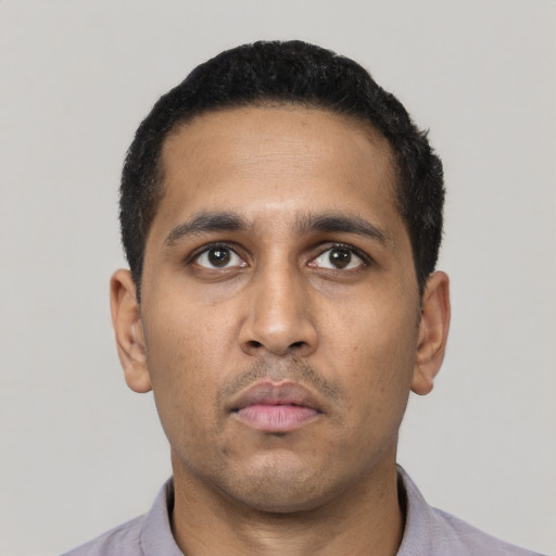 Neutral latino young-adult male with short  black hair and brown eyes