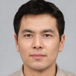 Neutral asian young-adult male with short  brown hair and brown eyes