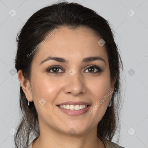 Joyful white young-adult female with long  brown hair and brown eyes