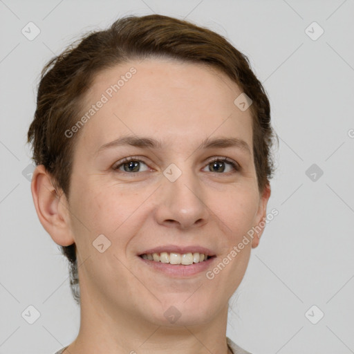 Joyful white adult female with short  brown hair and grey eyes