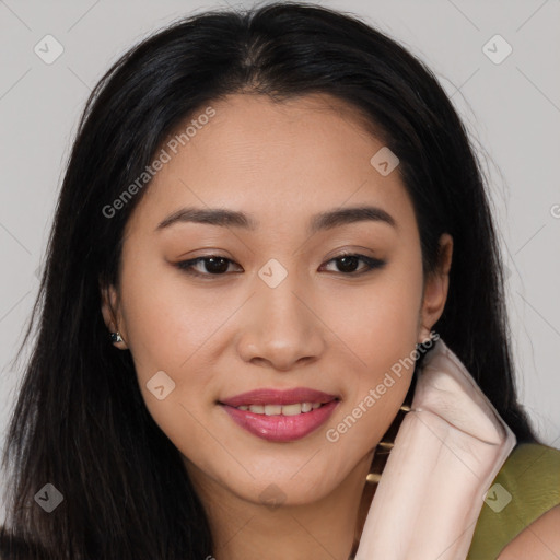 Joyful latino young-adult female with long  brown hair and brown eyes