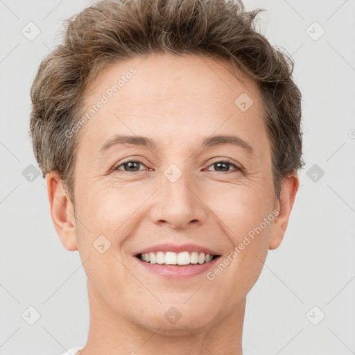 Joyful white young-adult female with short  brown hair and brown eyes