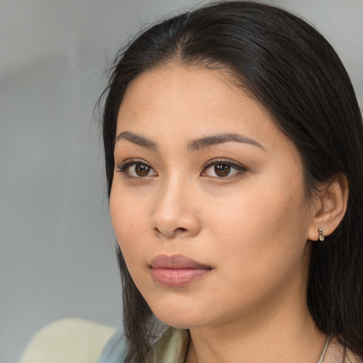 Neutral asian young-adult female with long  black hair and brown eyes