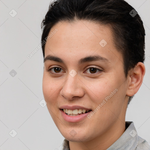 Joyful white young-adult female with short  brown hair and brown eyes